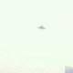 Illustration for article titled A UFO emerges from the smog over Beijing